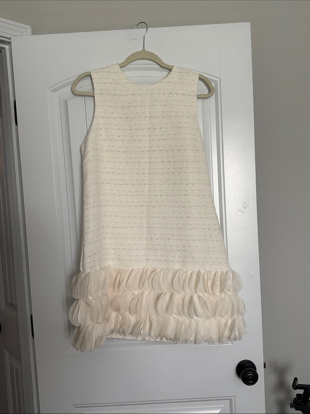 Sleeveless Cream Ruffle-Hem Mini Dress